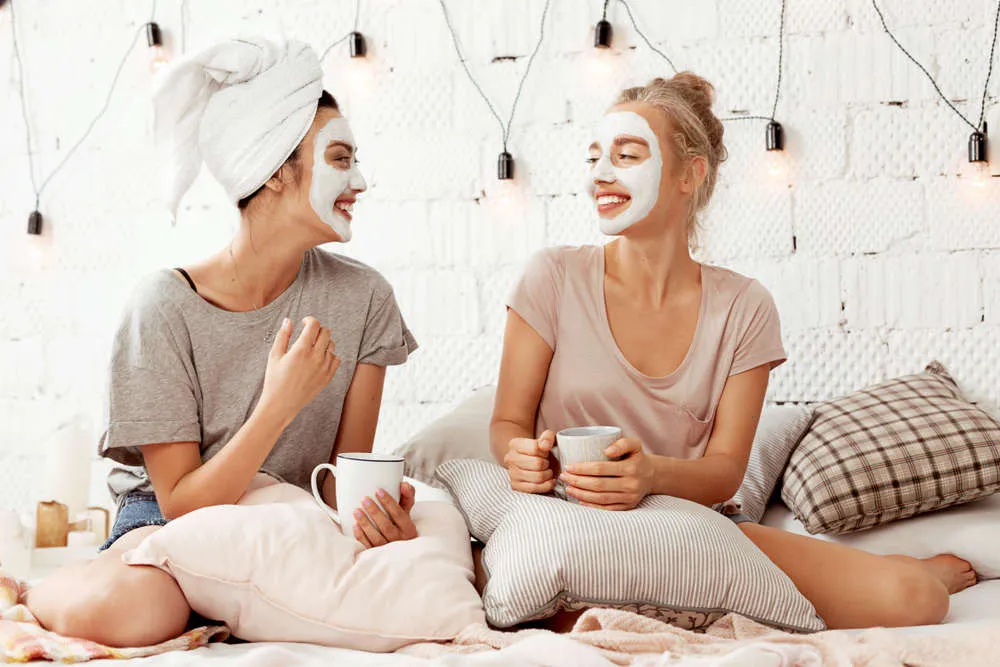 Two young women are discussing the 10 best skin care tips of all time